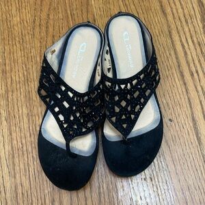 Black suede with black bead detailing, gives it a little bit of glam